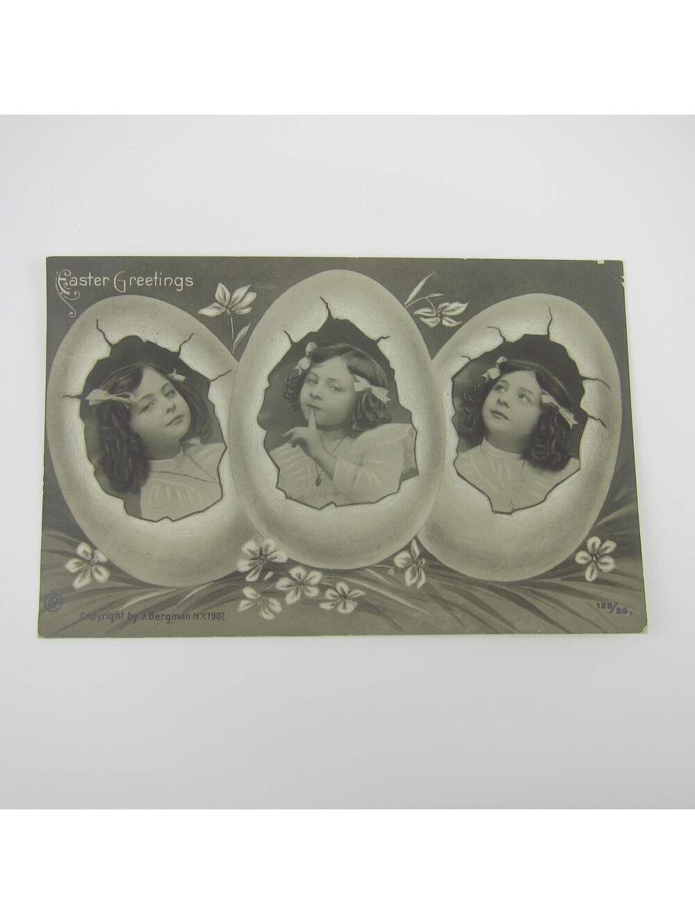 Easter Postcard Girl Portrait in Hatched Eggs White Dress Hair Bows Antique 1909